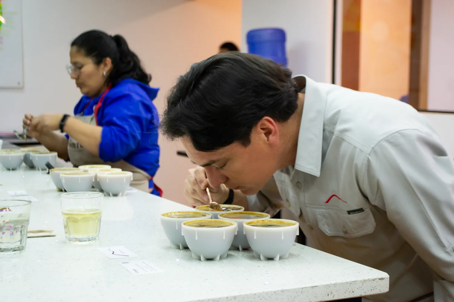 Juan Peña cupping at the CafExporto lab in Cuenca
