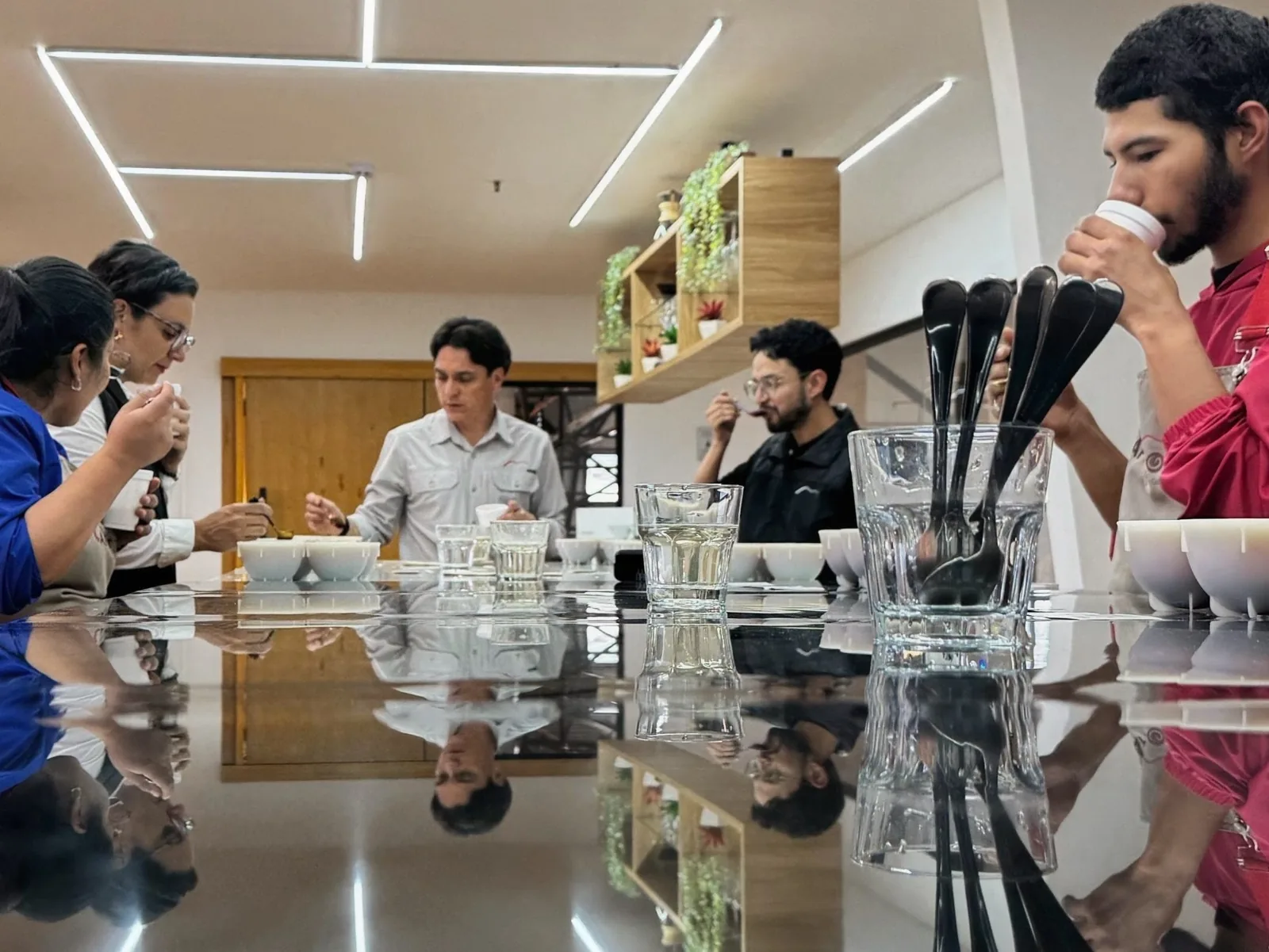 The team at the internal cupping school in Cuenca