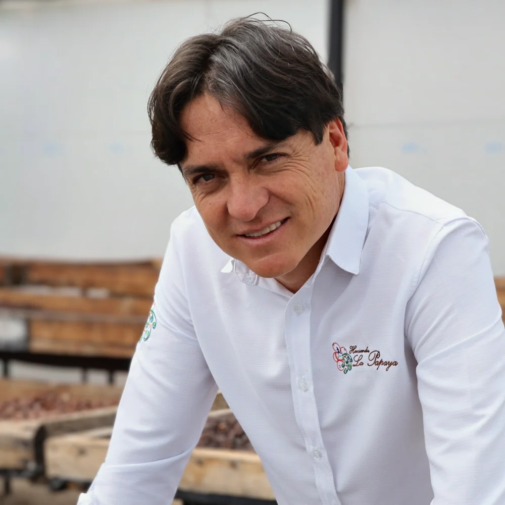 Juan Peña at the drying beds, Hacienda La Papaya